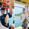 tu-tay-cau-trong-tour-cau-ca-nha-trang